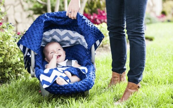 a dark blue car seat canopy