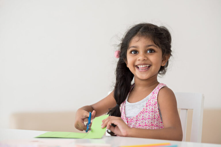 Cheerful little Sanskrit origin girl