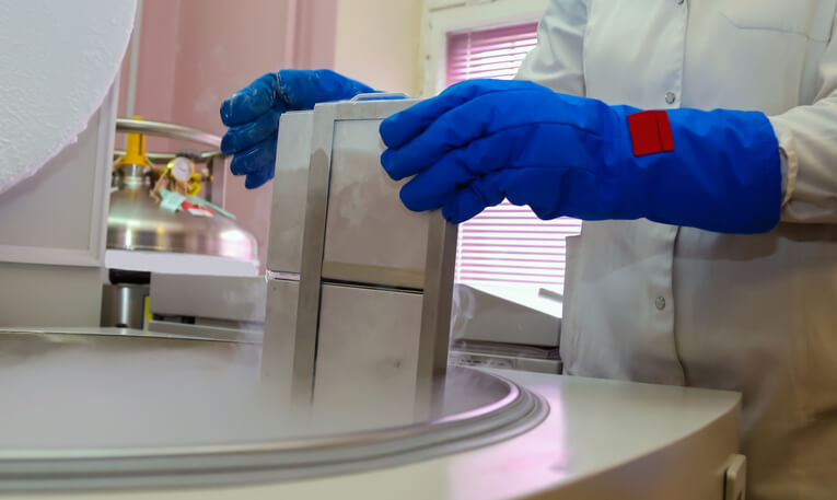 Placental cord blood bank donated blood unit prepared by gloved hands