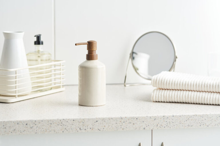 Soap and towels on cupboard