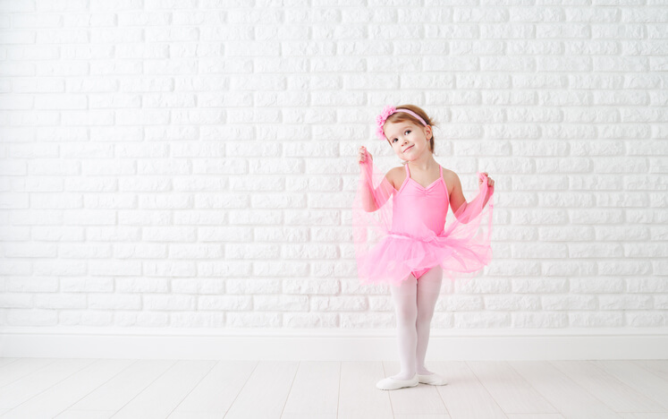 a cute girl wearing her balet costume