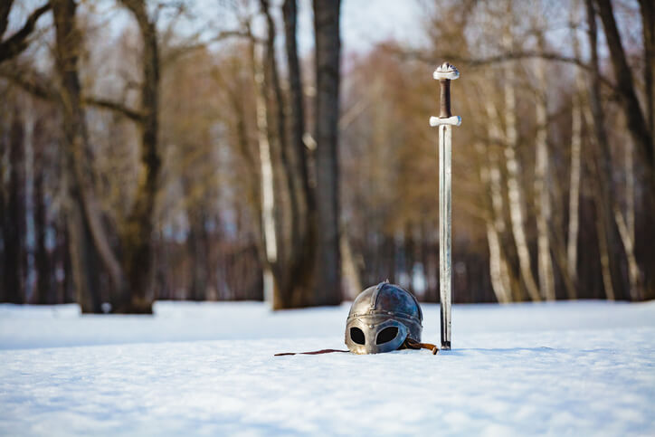 Image of steel sword and helmet fantasy medieval period