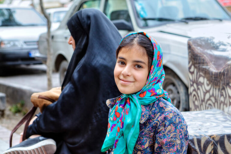 Portrait of a smiling Iranian teenage girl in hijab