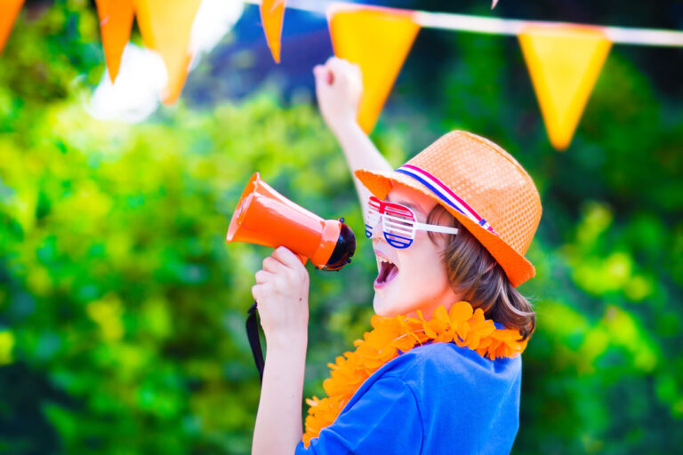 Dutch football fan, little teenager boy cheering